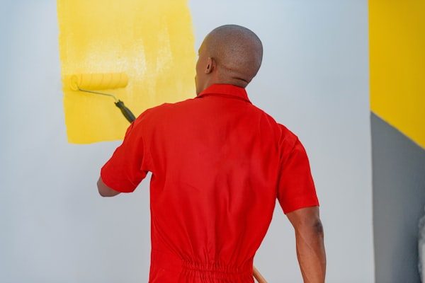 Painter working in a commercial interior